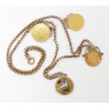 A 9CT GOLD CHAIN WITH FOUR ATTACHED GOLD COINS to include a 1894 South African one pond coin, an