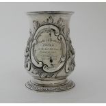 A GEORGE II SILVER TANKARD unclear maker's marks, London 1755, of baluster shape with scrolling