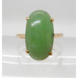 A 14K CHINESE GREEN HARDSTONE RING hardstone approx 16.8mm x 9.5cm, finger size N, weight 3.6gms