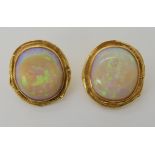 A PAIR OF 18CT GOLD OPAL CLIP ON EARRINGS dimensions 2.7cm x 2.4cm, weight 17.6gms Condition Report: