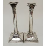 A SILVER CANDLESTICK by Thomas Bradbury & Son, rubbed London hallmarks, the removable drip pan on