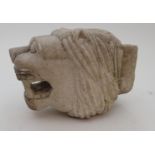 AN INDIAN WHITE MARBLE FOUNTAIN HEAD carved as a snarling lion, 20.5cm high, 16.5cm wide and 29cm