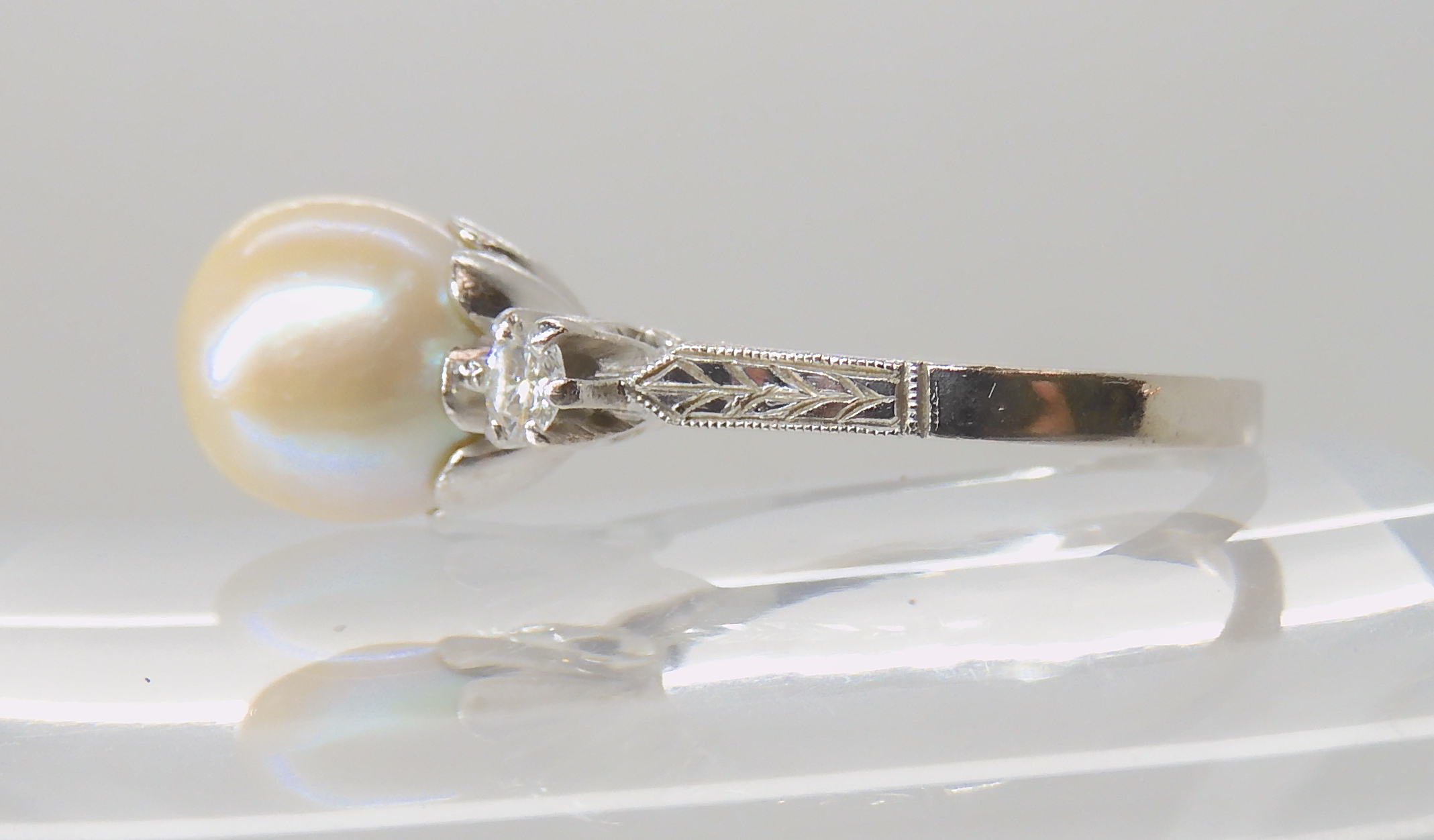 AN 18CT WHITE GOLD PEARL AND DIAMOND RING with wreath engraved shoulders, pearl approx 9mm in - Image 4 of 5