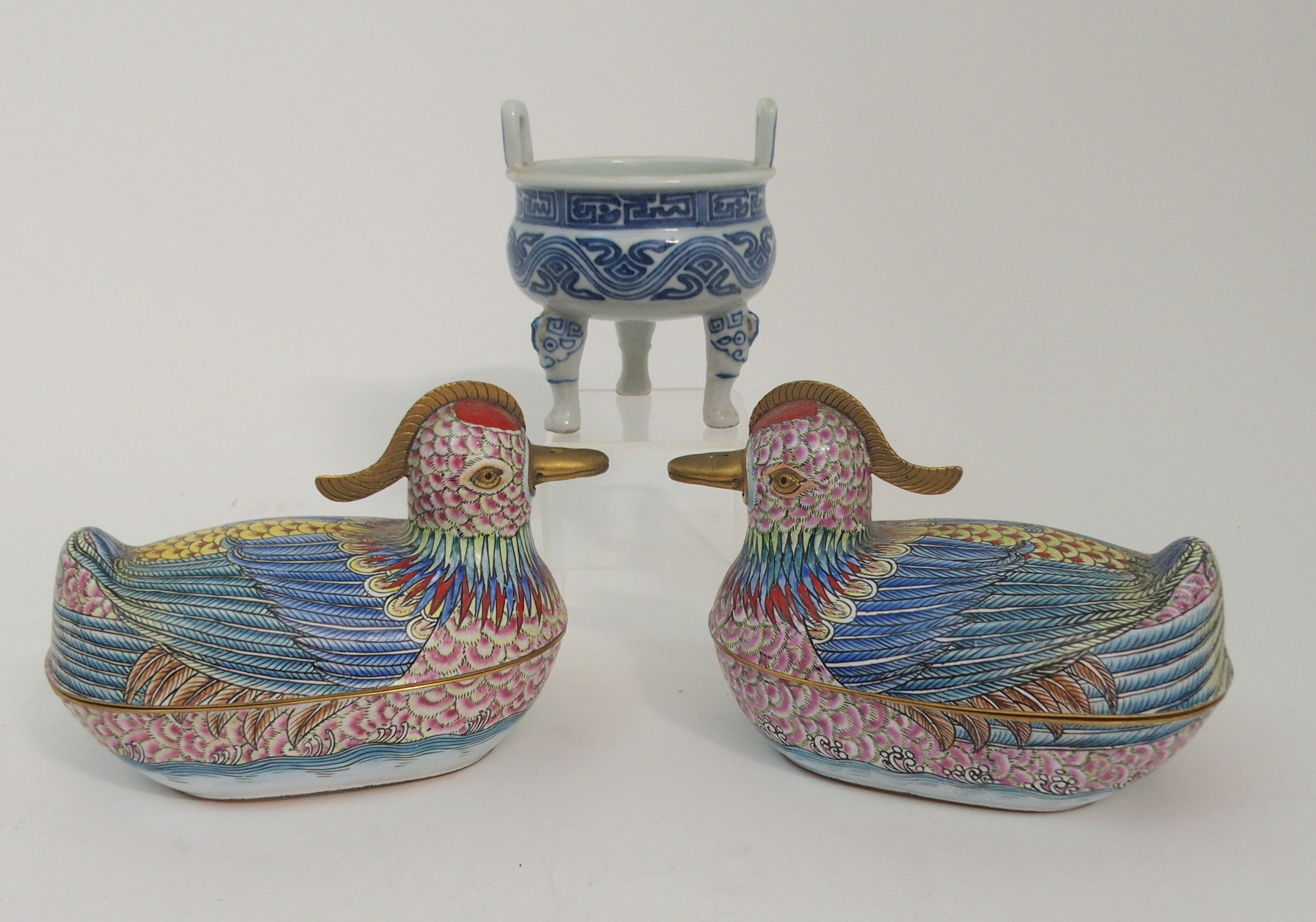 A PAIR OF CANTON ENAMEL MANDARIN DUCK TUREENS each painted with bright colours and with brass