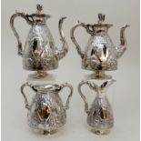 AN EDWARDIAN SILVER FOUR-PIECE TEA AND COFFEE SERVICE by Walker & Hall, Sheffield 1901, pear