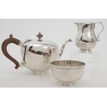 A TWO PIECE SILVER TEA SERVICE by Thomas Ducrow & Sons, Birmingham 1947