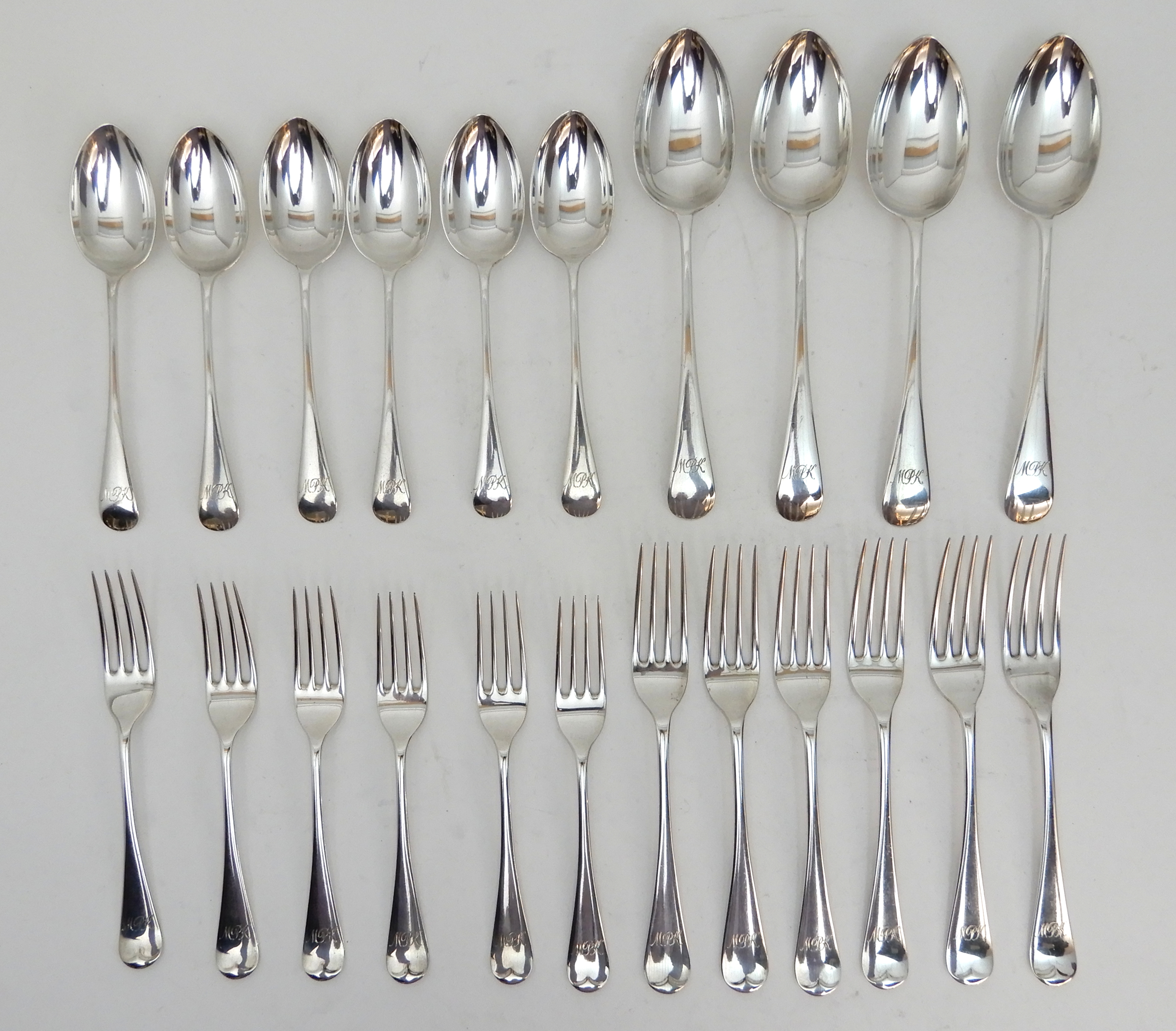 A CASED SET OF SILVER CUTLERY by James Dixon & Sons, Sheffield 1897, comprising for tablespoons, six