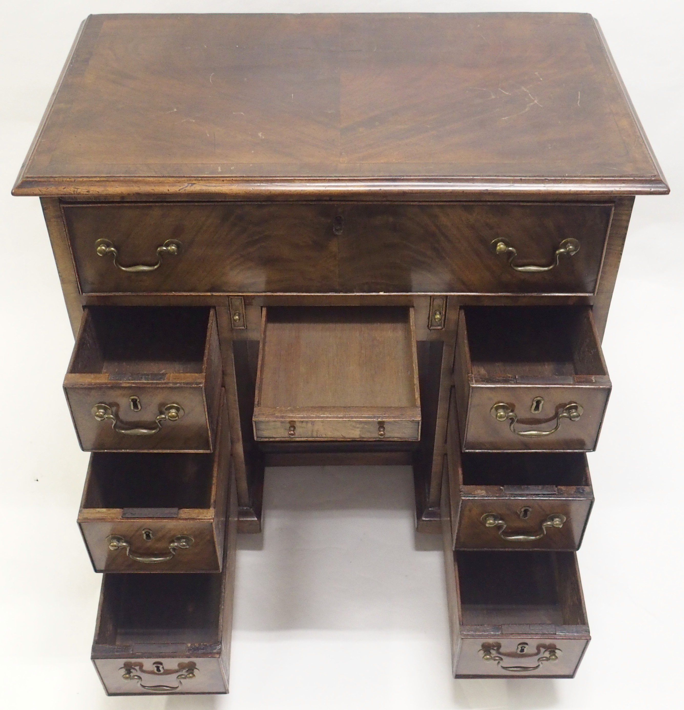 A GEORGE III STYLE MAHOGANY KNEEHOLE DESK with deep drawer above a shallow drawer and flanked by two - Image 5 of 8