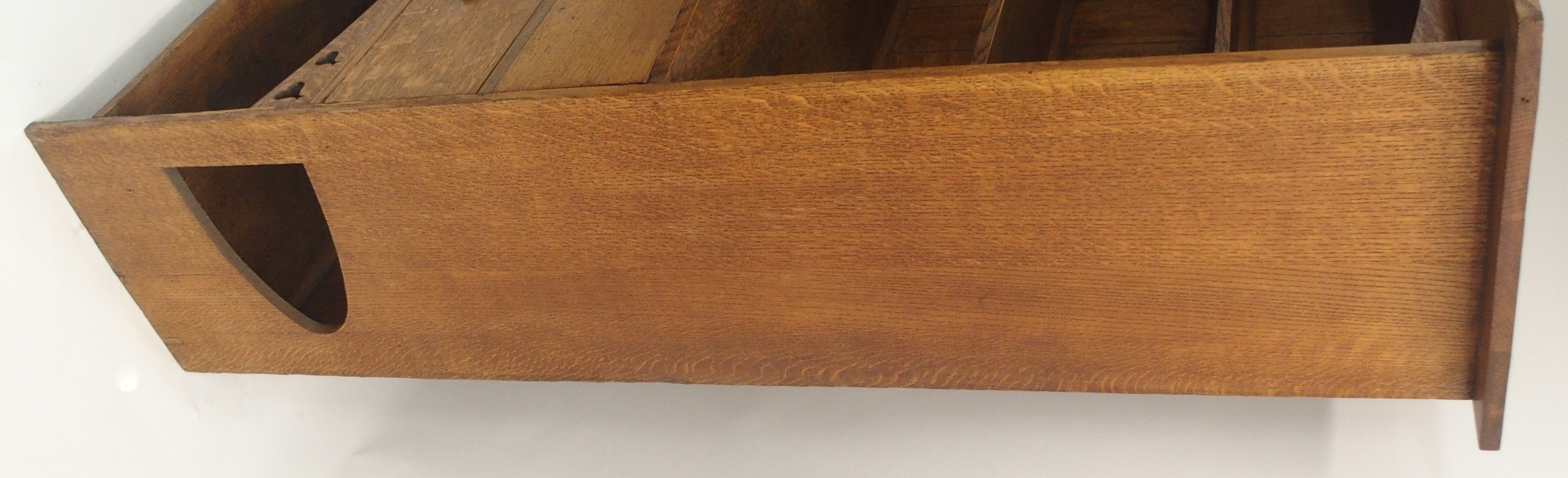 AN ARTS AND CRAFTS OAK DRESSER with open shelves, flanked by embossed inset brass panels and - Image 12 of 15