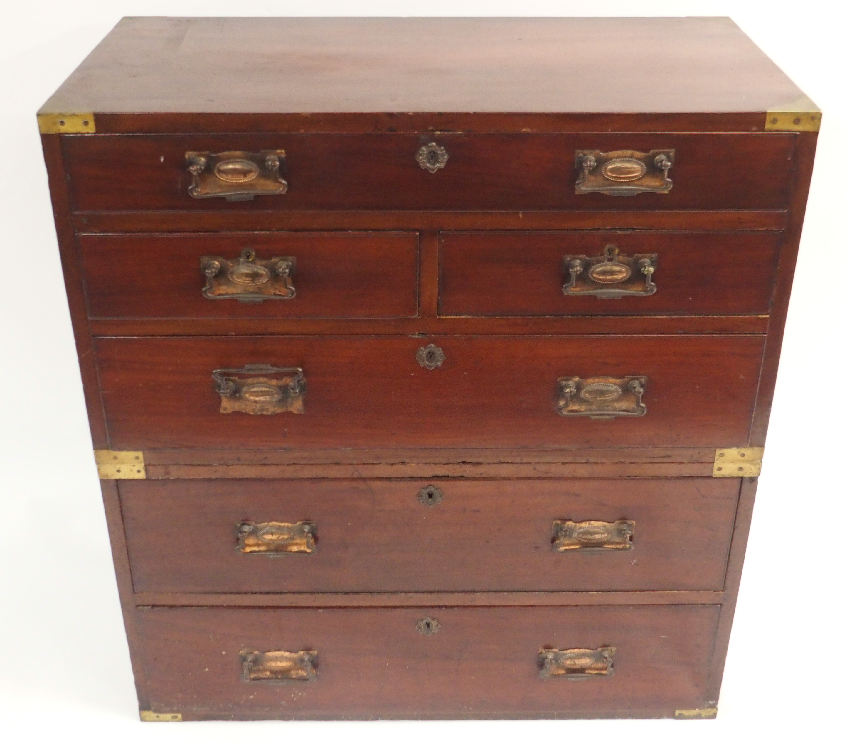 A TWO SECTION MAHOGANY SECRETAIRE CAMPAIGN CHEST The upper fitted drawer over two drawers and a full