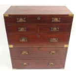 A TWO SECTION MAHOGANY SECRETAIRE CAMPAIGN CHEST The upper fitted drawer over two drawers and a full