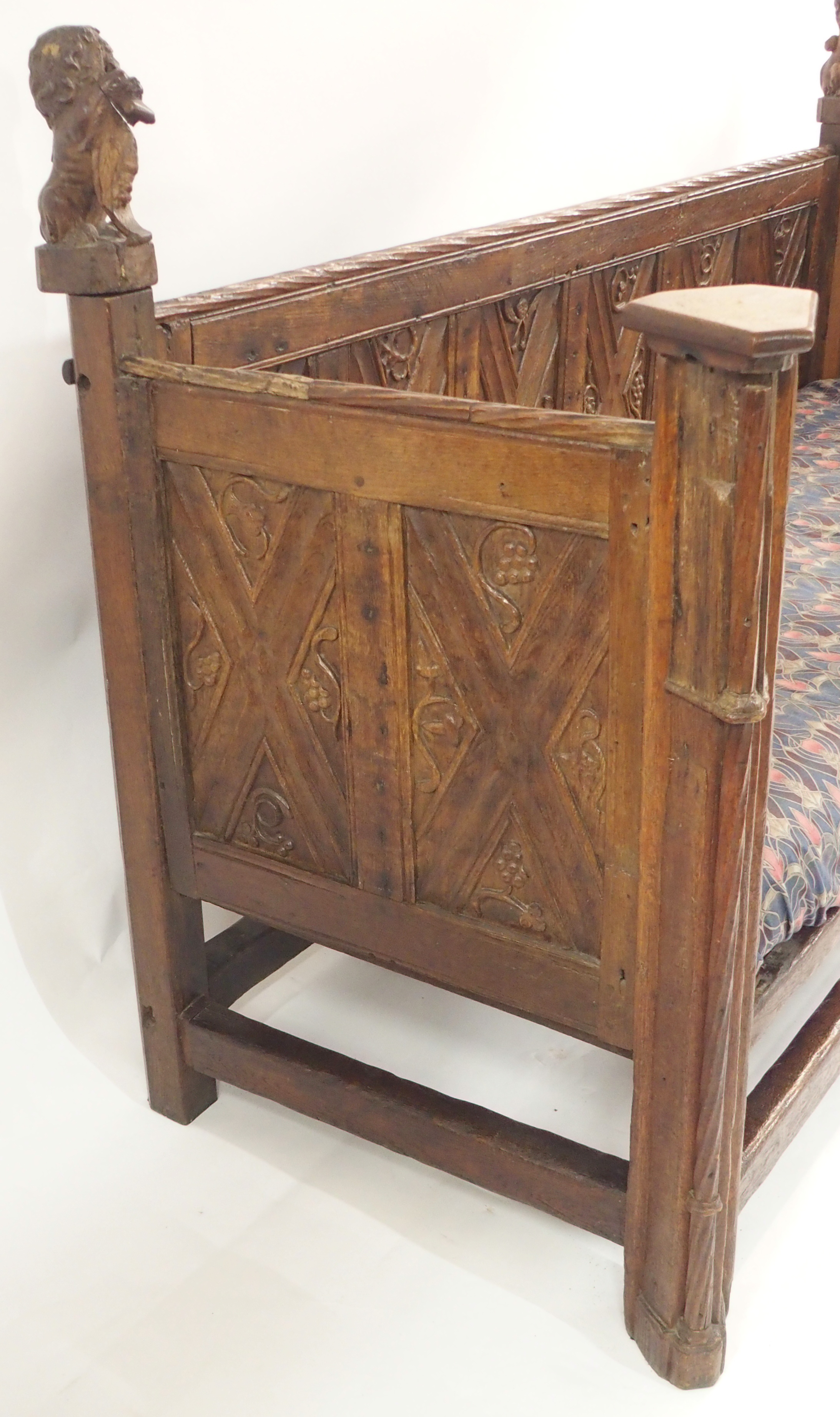 A FRENCH OAK GOTHIC STYLE DAY BED the panels carved with grape vines, chalice,cup and acorns beneath - Image 9 of 14