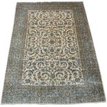 A CREAM GROUND KESHAN RUG with allover floral design, 383cm x 277cm Condition Report: Available upon