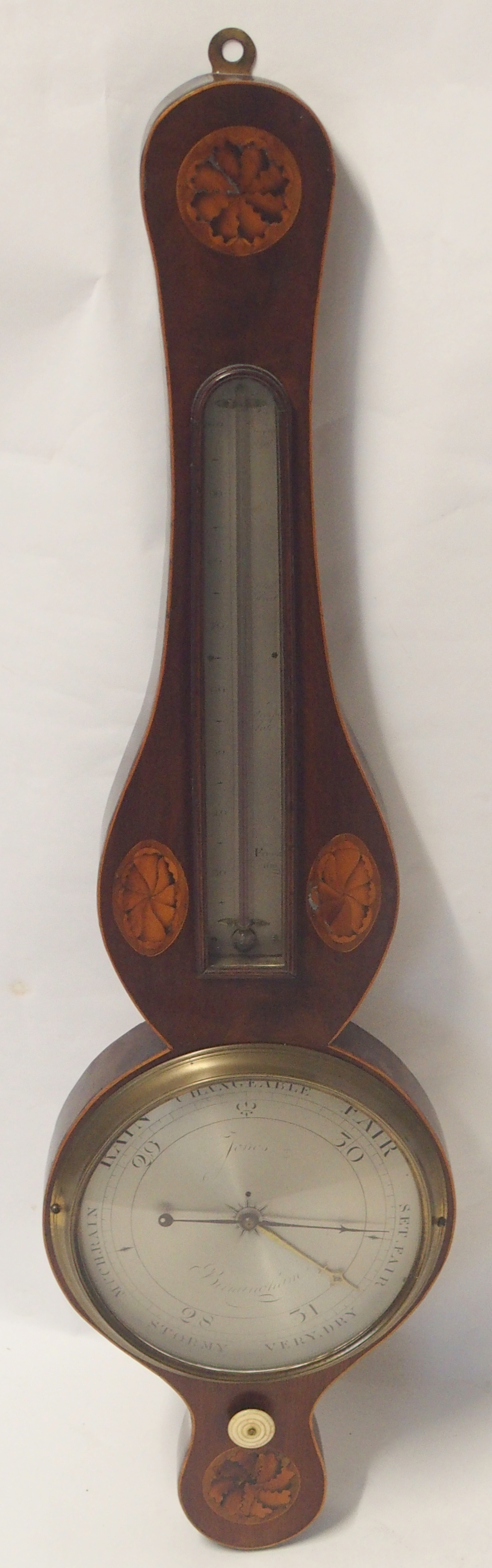 A GEORGE III MAHOGANY WHEEL BAROMETER AND THERMOMETER inscribed to Jones Birmingham, with inlaid
