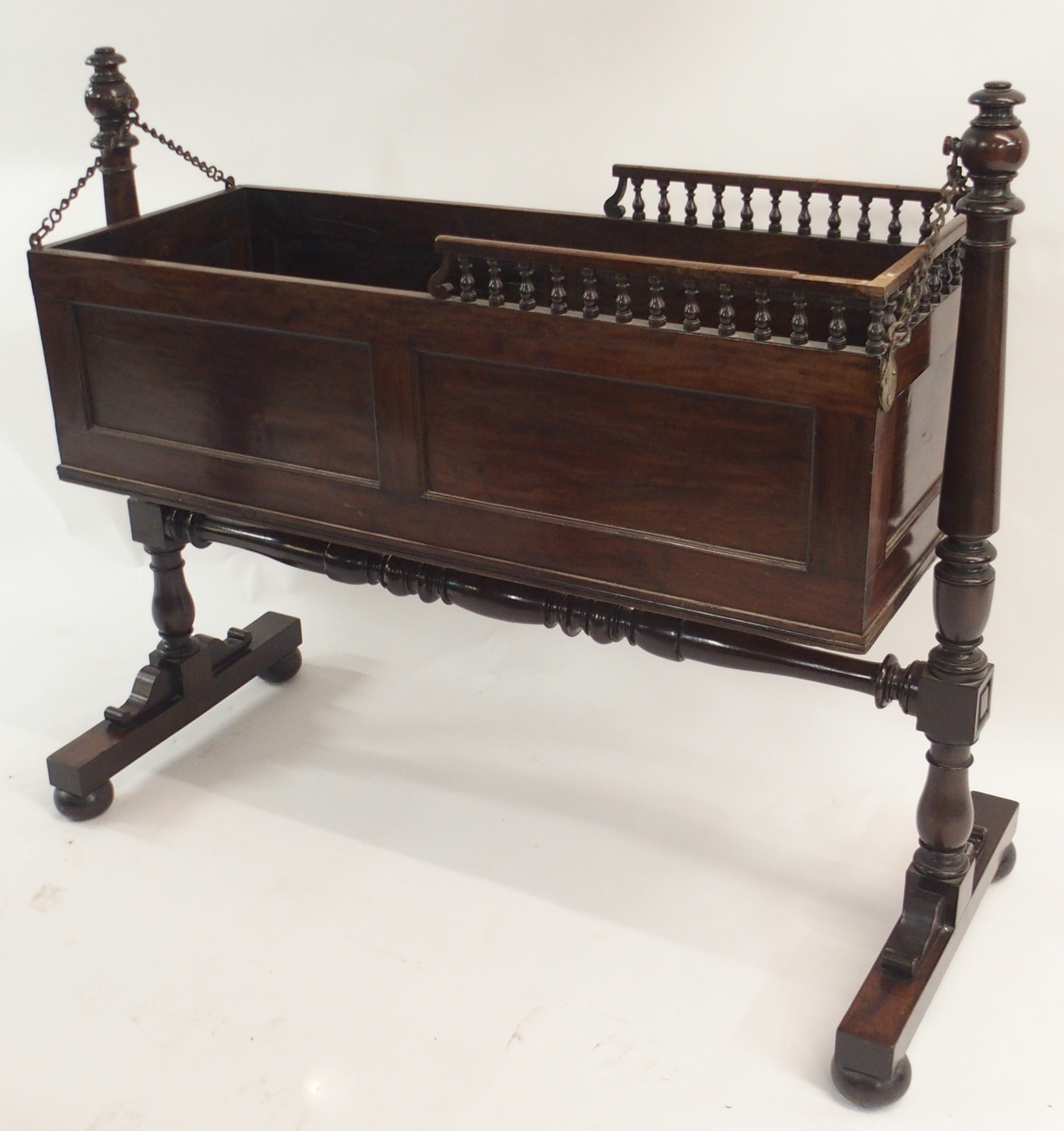 AN EARLY 19TH CENTURY MAHOGANY CRIB the panelled box with three quarter baluster gallery on chain - Image 3 of 6