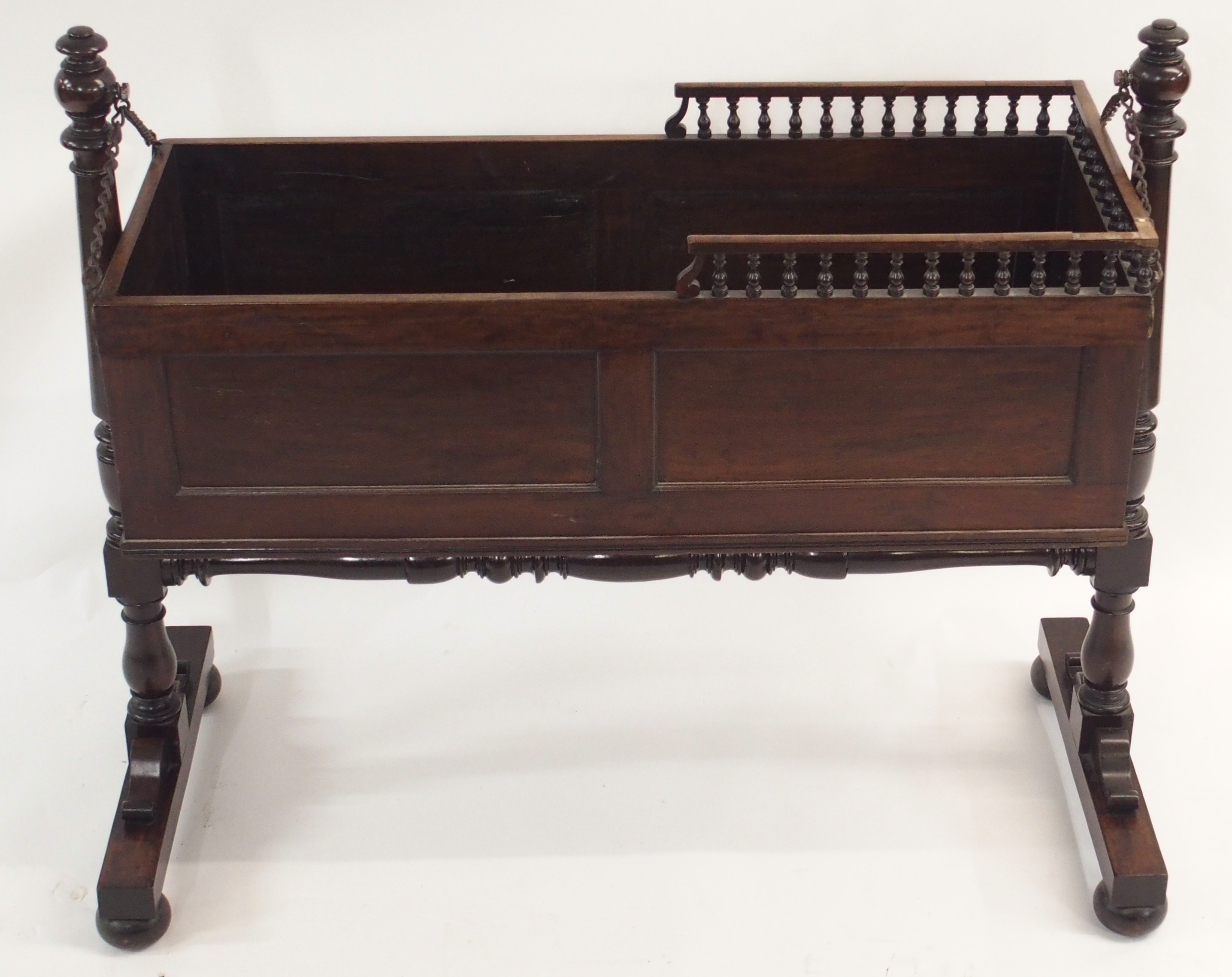 AN EARLY 19TH CENTURY MAHOGANY CRIB the panelled box with three quarter baluster gallery on chain - Image 2 of 6