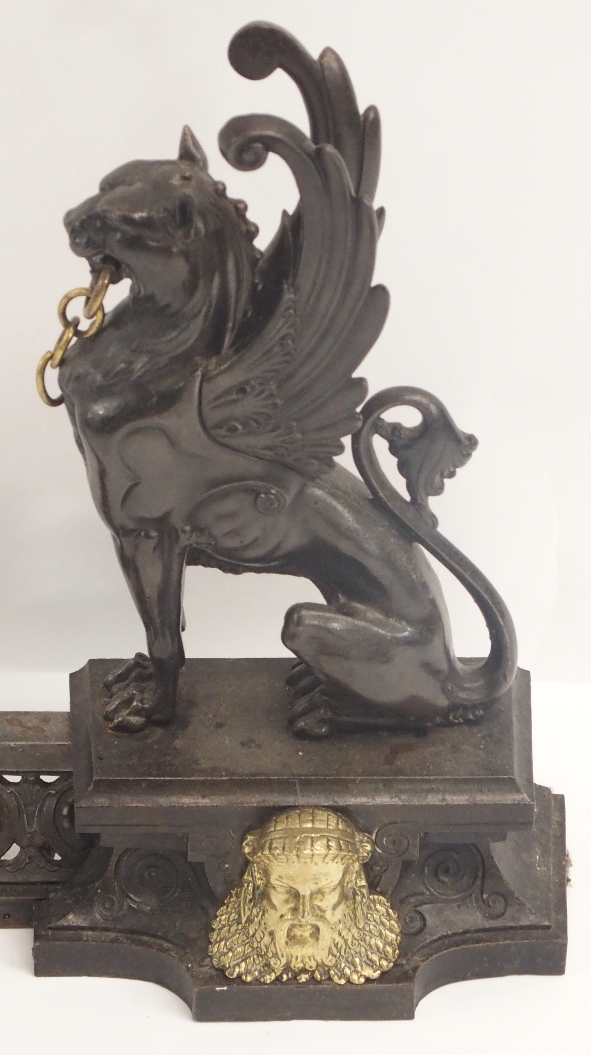 A 19TH CENTURY CAST STEEL AND BRASS FIREPLACE FENDER in three sections, modelled with winged - Image 3 of 15