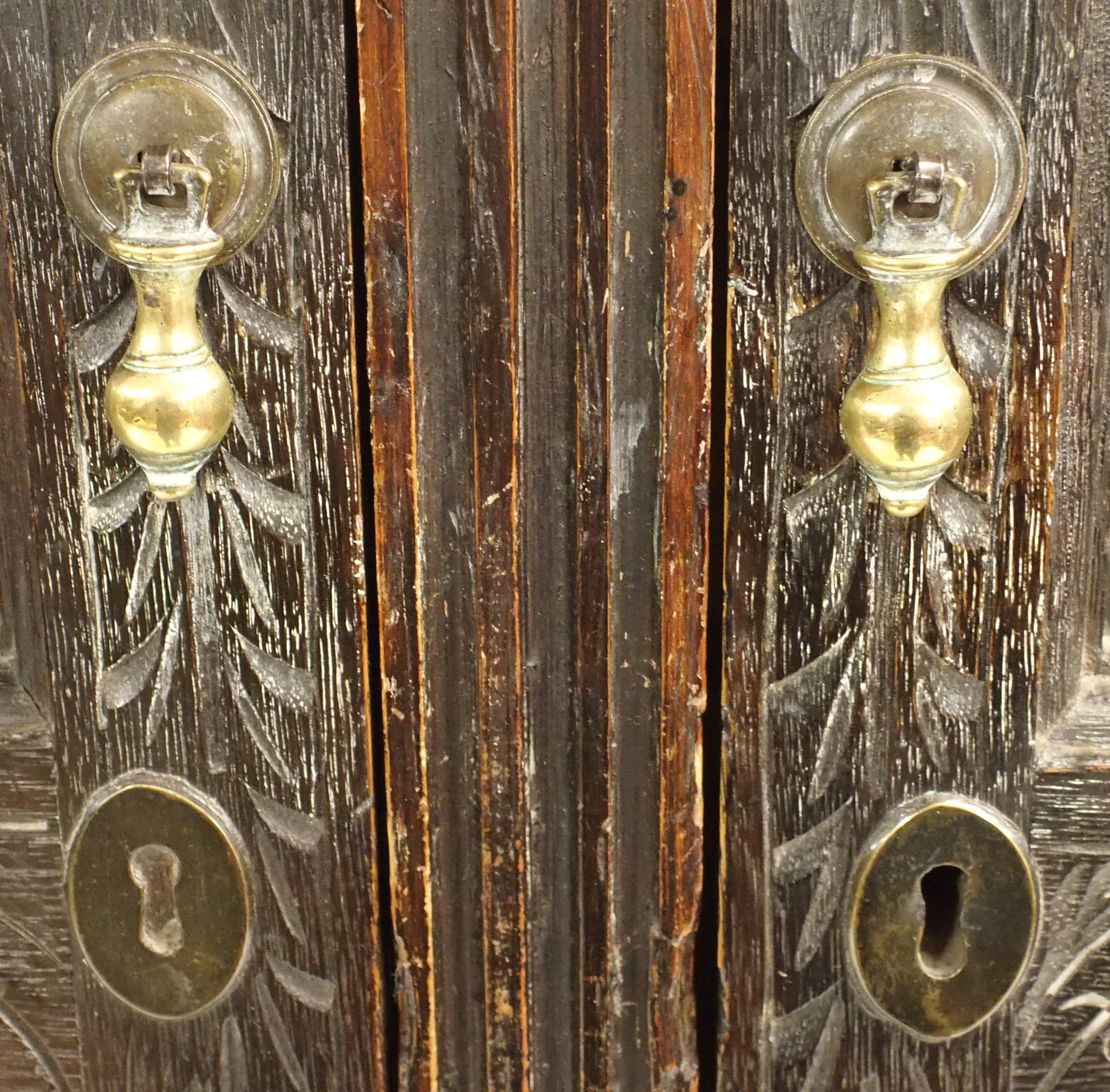 A VICTORIAN STAINED OAK CORNER DISPLAY CABINET carved allover with scrolling foliage, with a pair of - Image 9 of 15