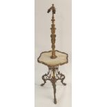 A BRASS TELESCOPIC STANDARD LAMP the triple light fitting above acanthus leaf cast neck with