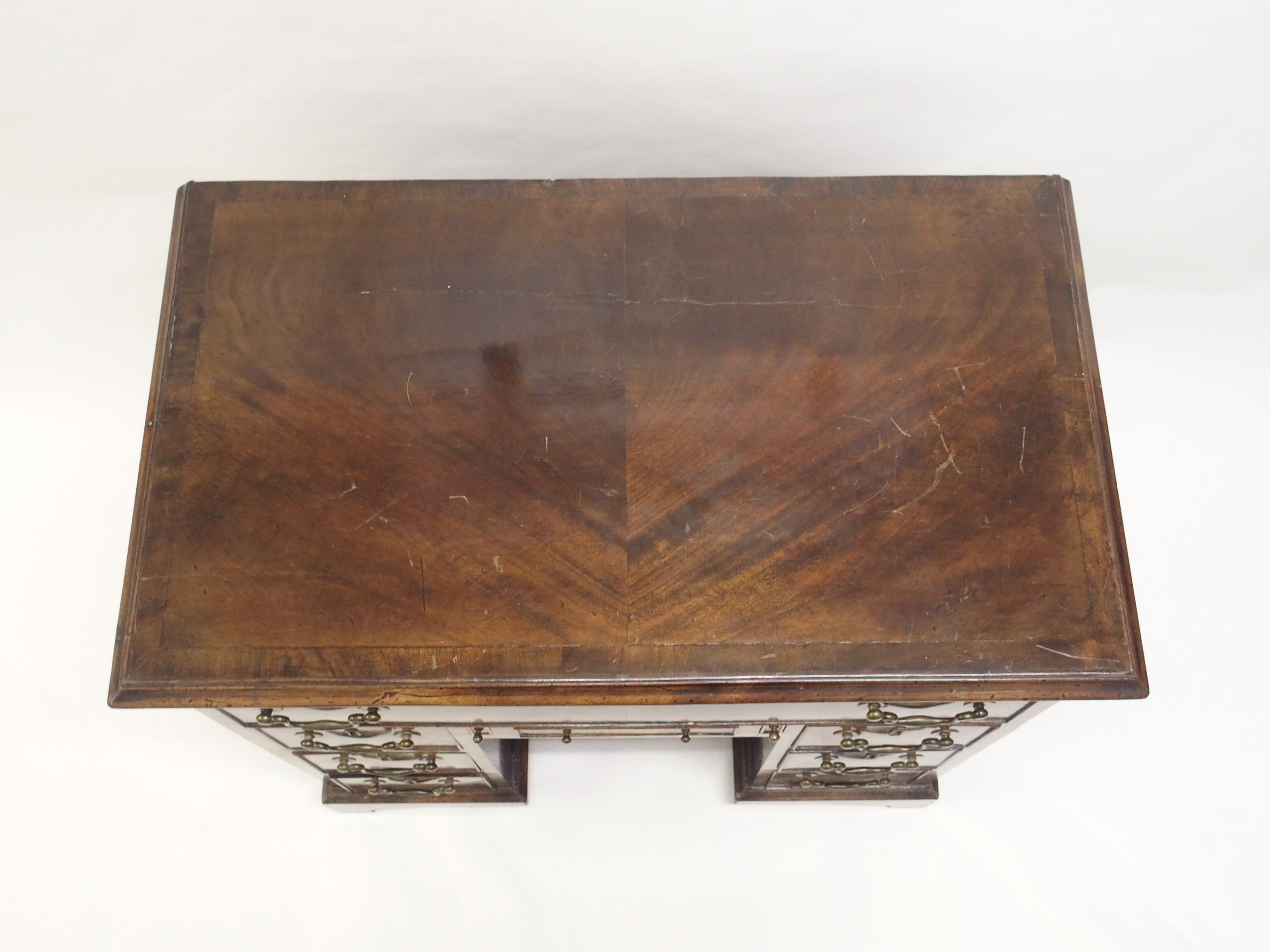 A GEORGE III STYLE MAHOGANY KNEEHOLE DESK with deep drawer above a shallow drawer and flanked by two - Image 2 of 8