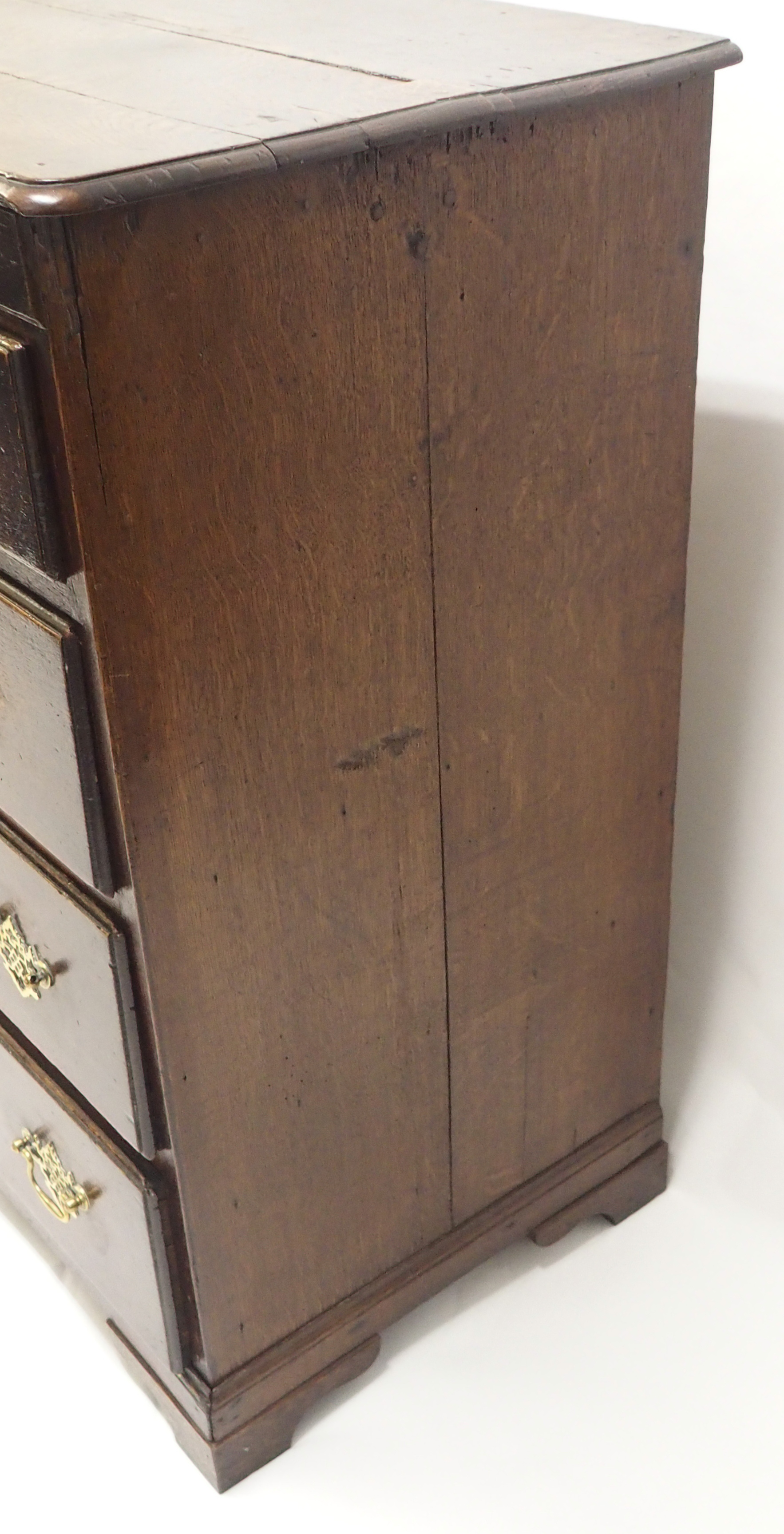 AN 18TH CENTURY OAK CHEST with shaped frieze above a central linen fold drawer, flanked by two short - Image 3 of 8