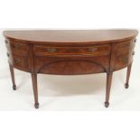 BRIGHTS OF NETTLEBED WALNUT DEMILUNE SIDEBOARD with a central narrow drawer above a deep drawer,