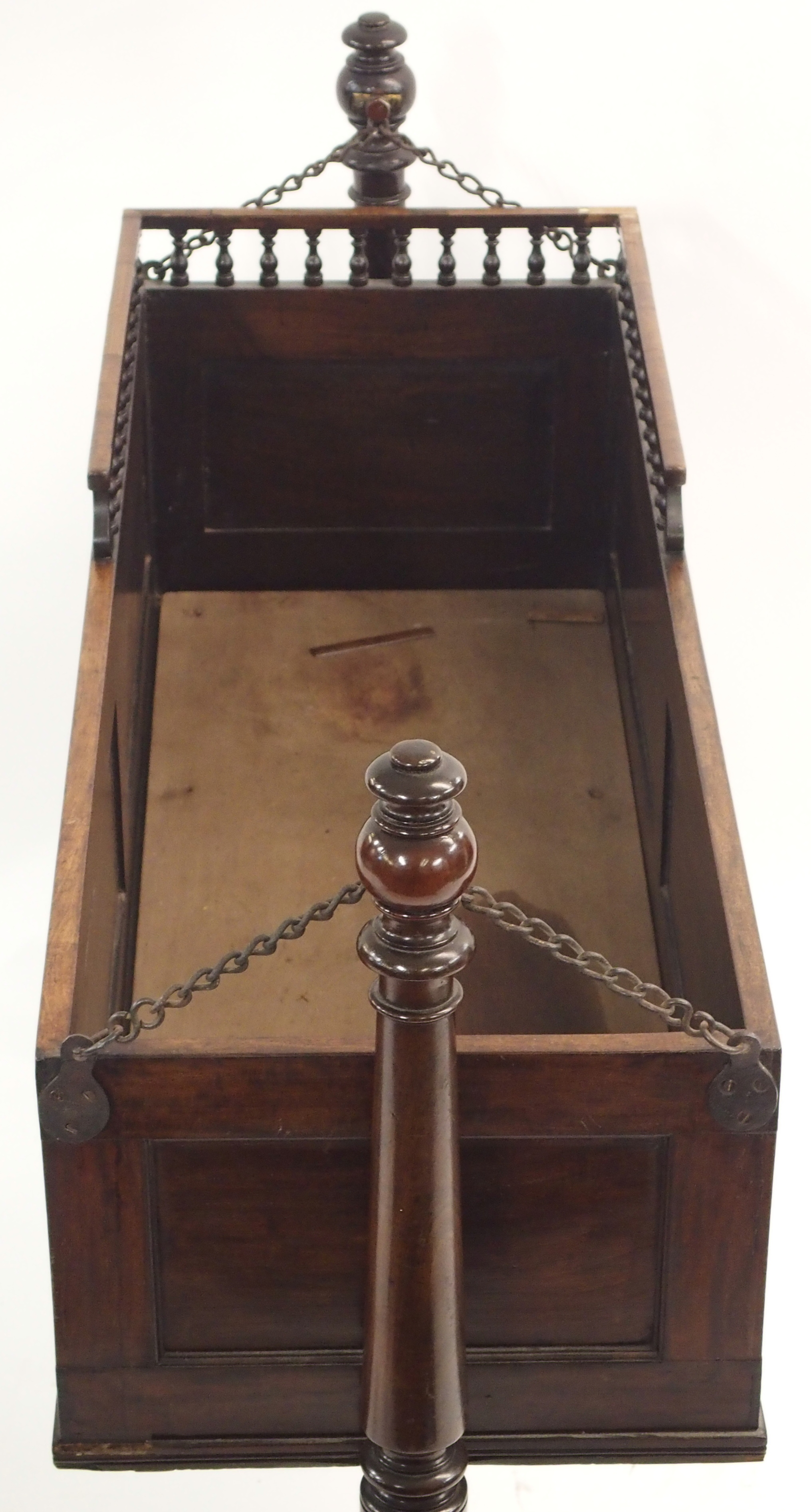 AN EARLY 19TH CENTURY MAHOGANY CRIB the panelled box with three quarter baluster gallery on chain - Image 5 of 6