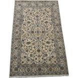 A CREAM GROUND KESHAN with allover floral design, 240cm x 146cm Condition Report: Available upon