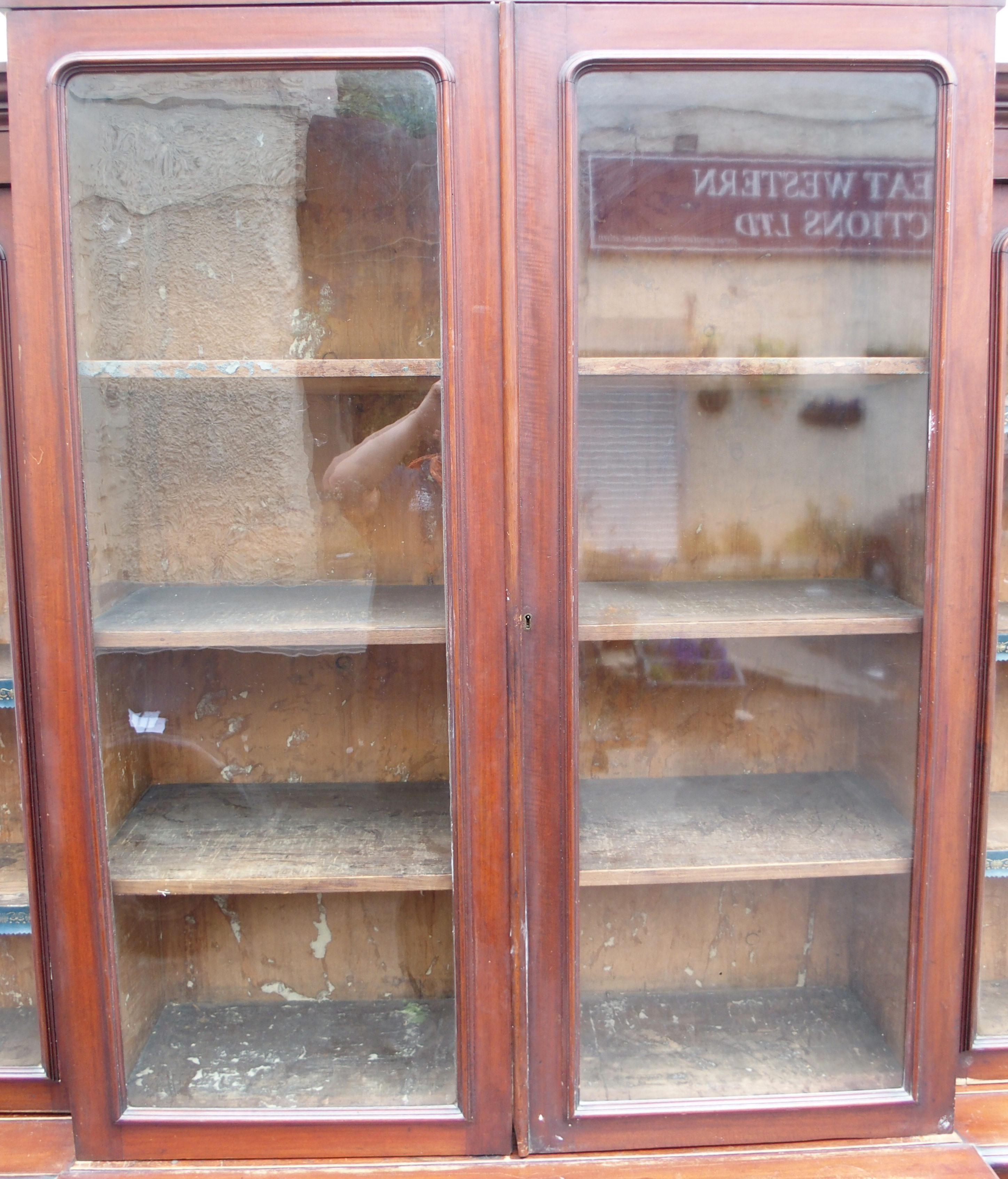 A VICTORIAN MAHOGANY BREAK FRONT BOOKCASE, with four glazed doors over a base with four doors, 231cm - Image 5 of 15