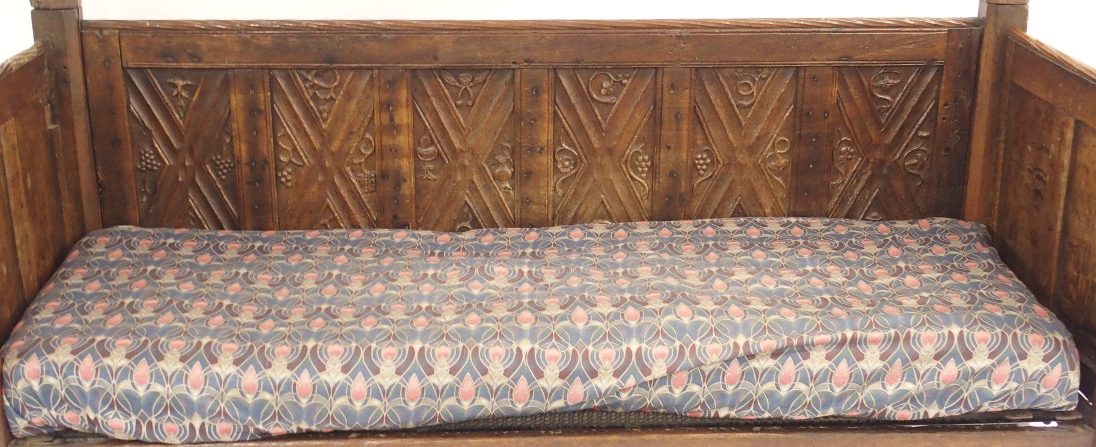 A FRENCH OAK GOTHIC STYLE DAY BED the panels carved with grape vines, chalice,cup and acorns beneath - Image 2 of 14
