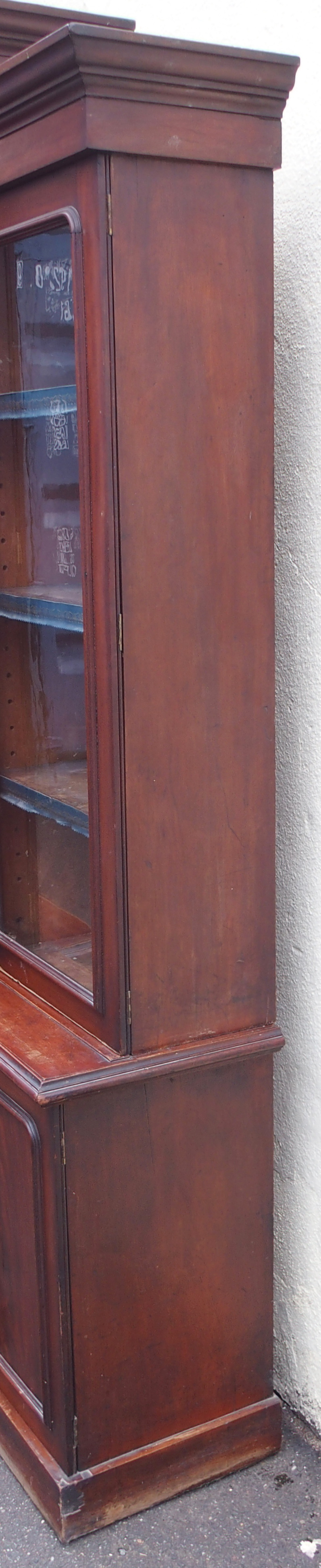 A VICTORIAN MAHOGANY BREAK FRONT BOOKCASE, with four glazed doors over a base with four doors, 231cm - Image 7 of 15