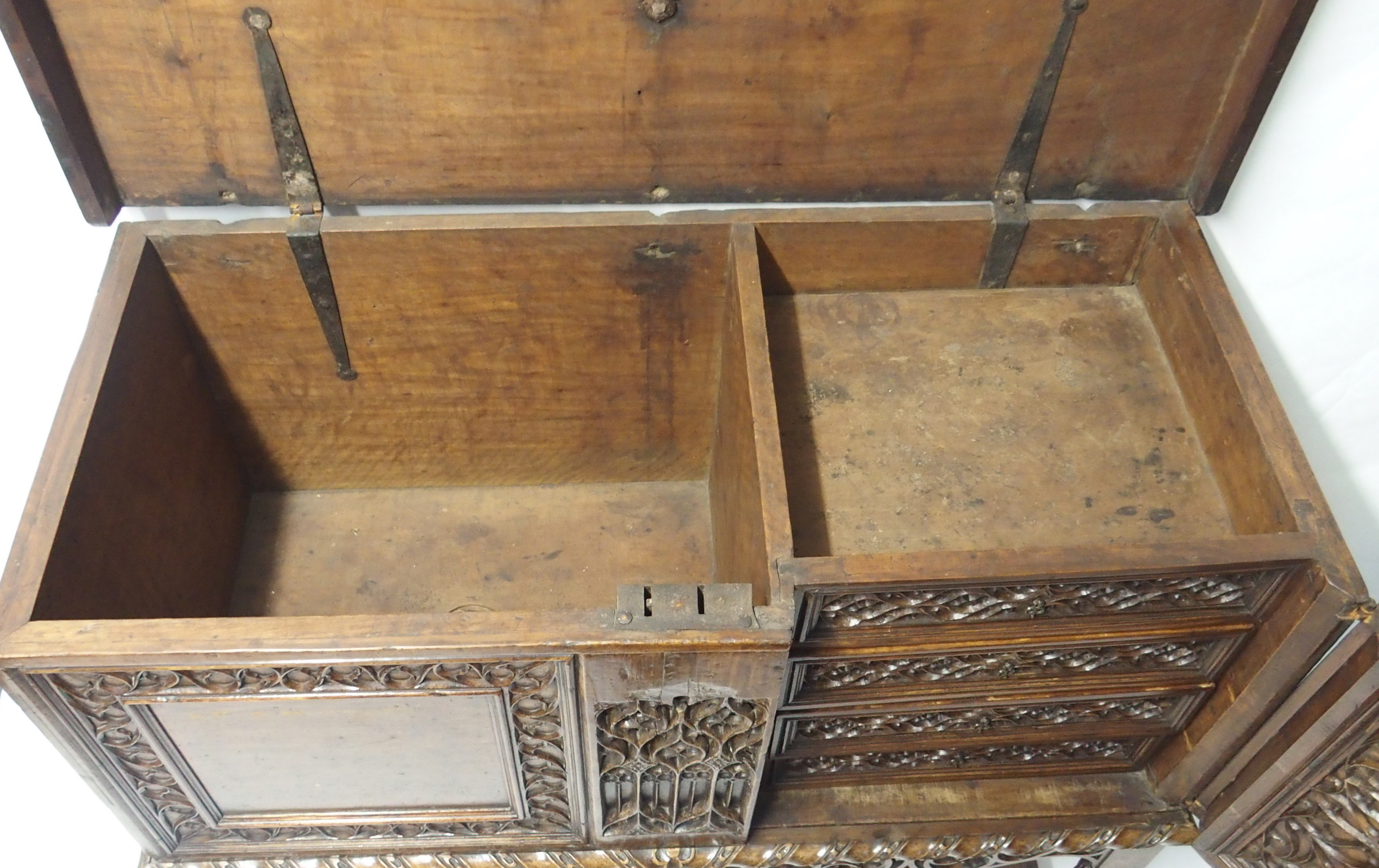 A FRENCH WALNUT LIVERY CUPBOARD the hinged top enclosing a deep and shallow recess, the front carved - Image 4 of 11