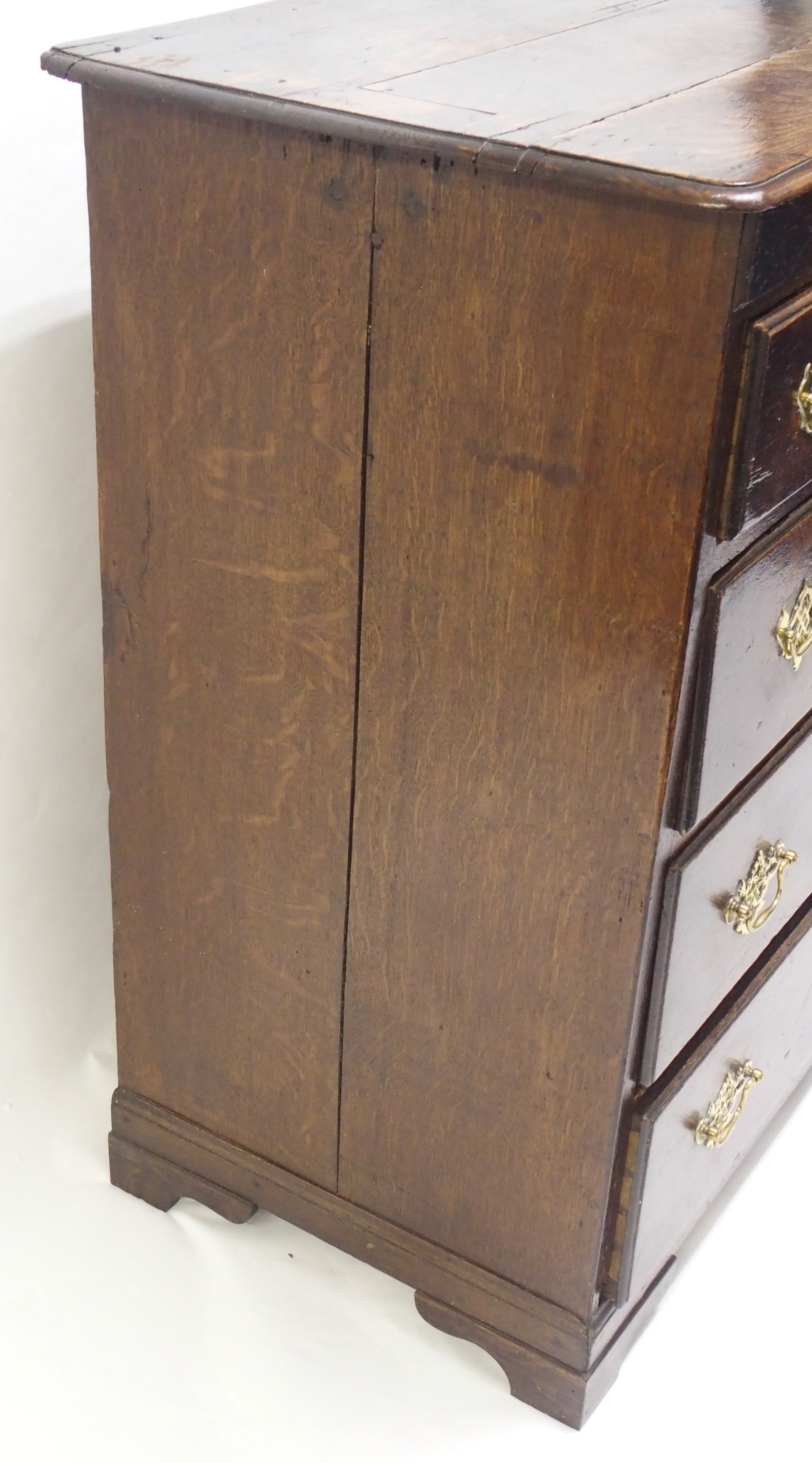 AN 18TH CENTURY OAK CHEST with shaped frieze above a central linen fold drawer, flanked by two short - Image 4 of 8