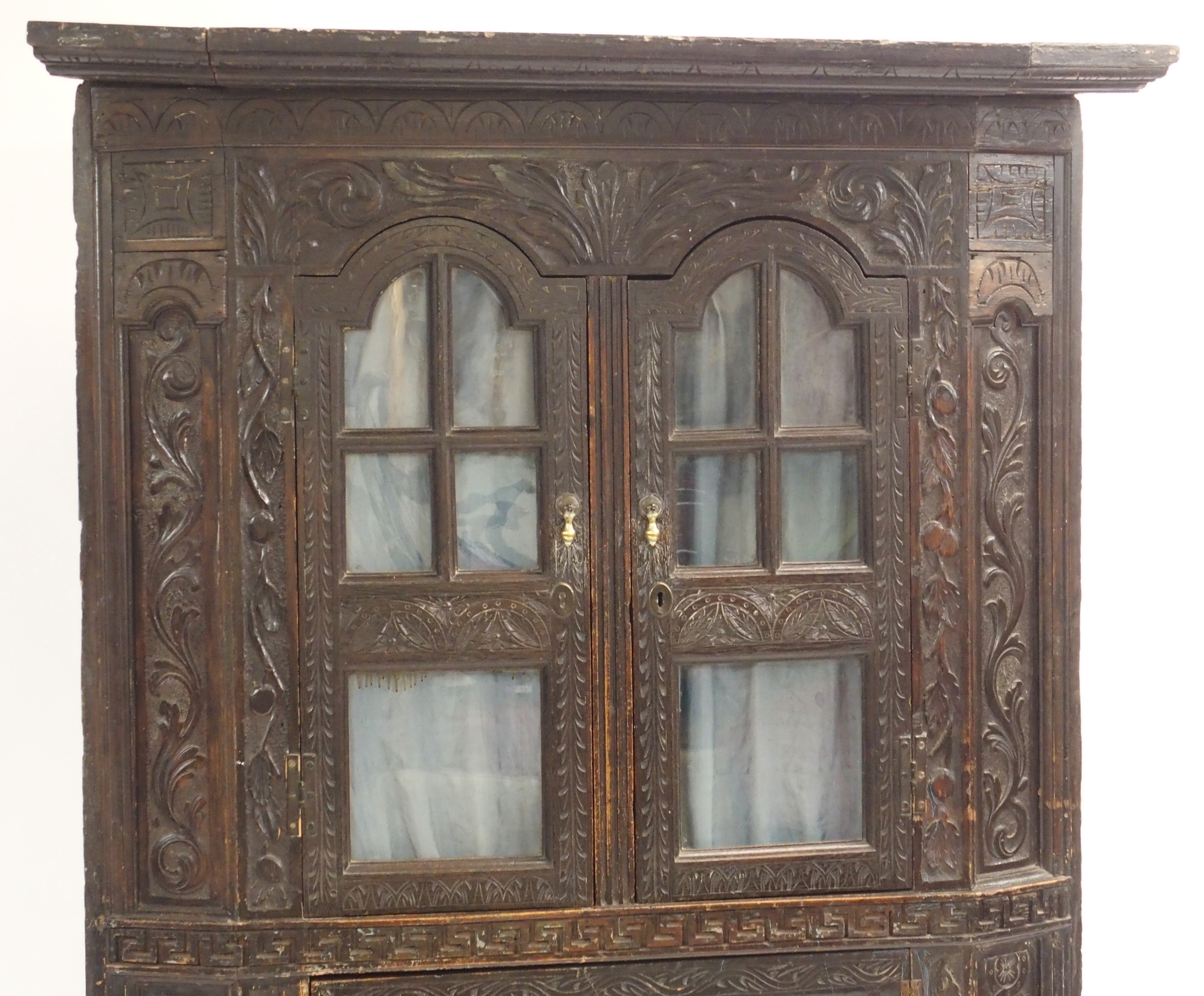 A VICTORIAN STAINED OAK CORNER DISPLAY CABINET carved allover with scrolling foliage, with a pair of - Image 2 of 15