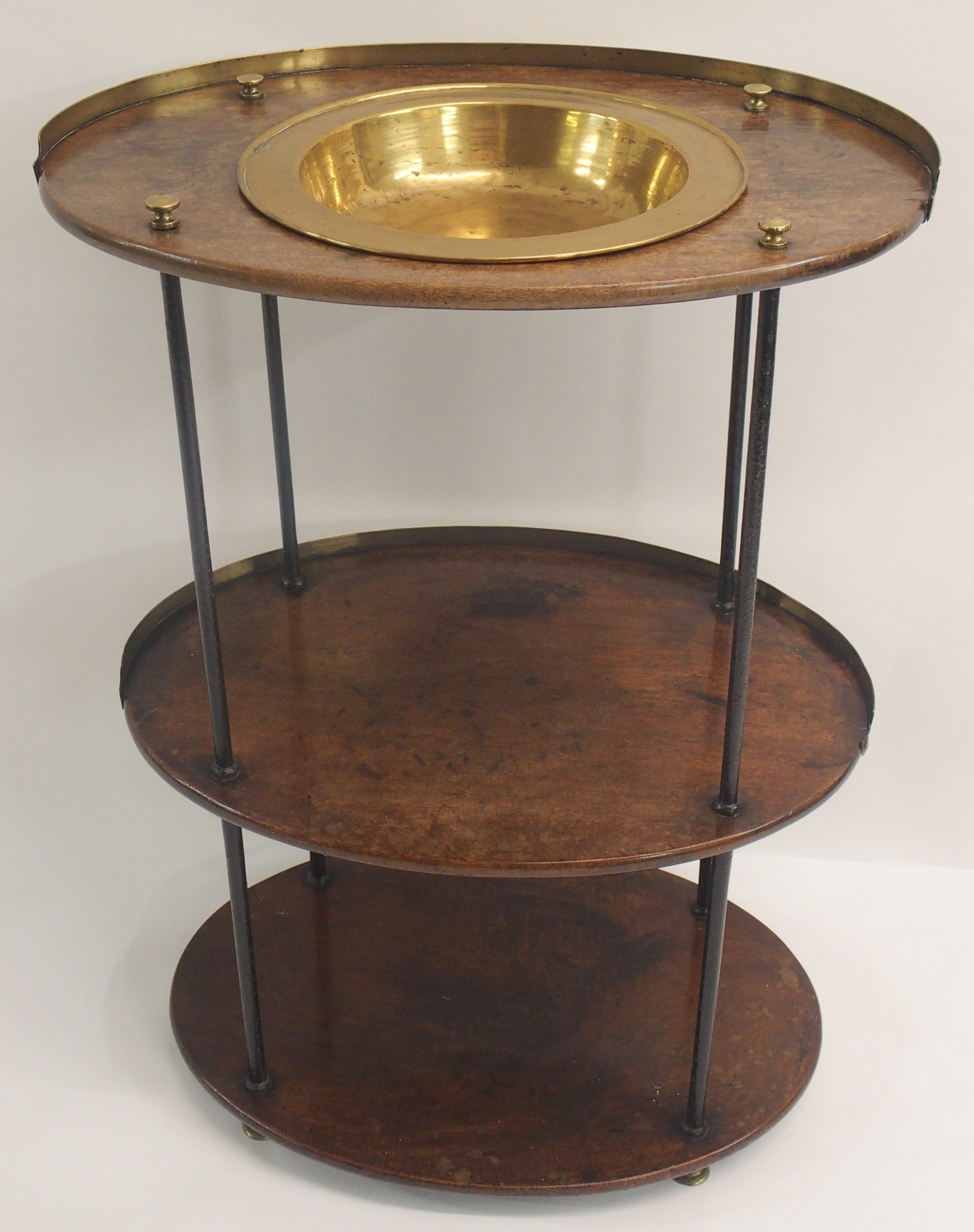 A 19TH CENTURY BRITISH MILITARY OFFICERS CAMPAIGN WASH STAND the three-tiered teak and brass mounted
