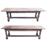 TWO OAK REFECTORY TABLES each with three plank top, with square baluster legs, joined by a