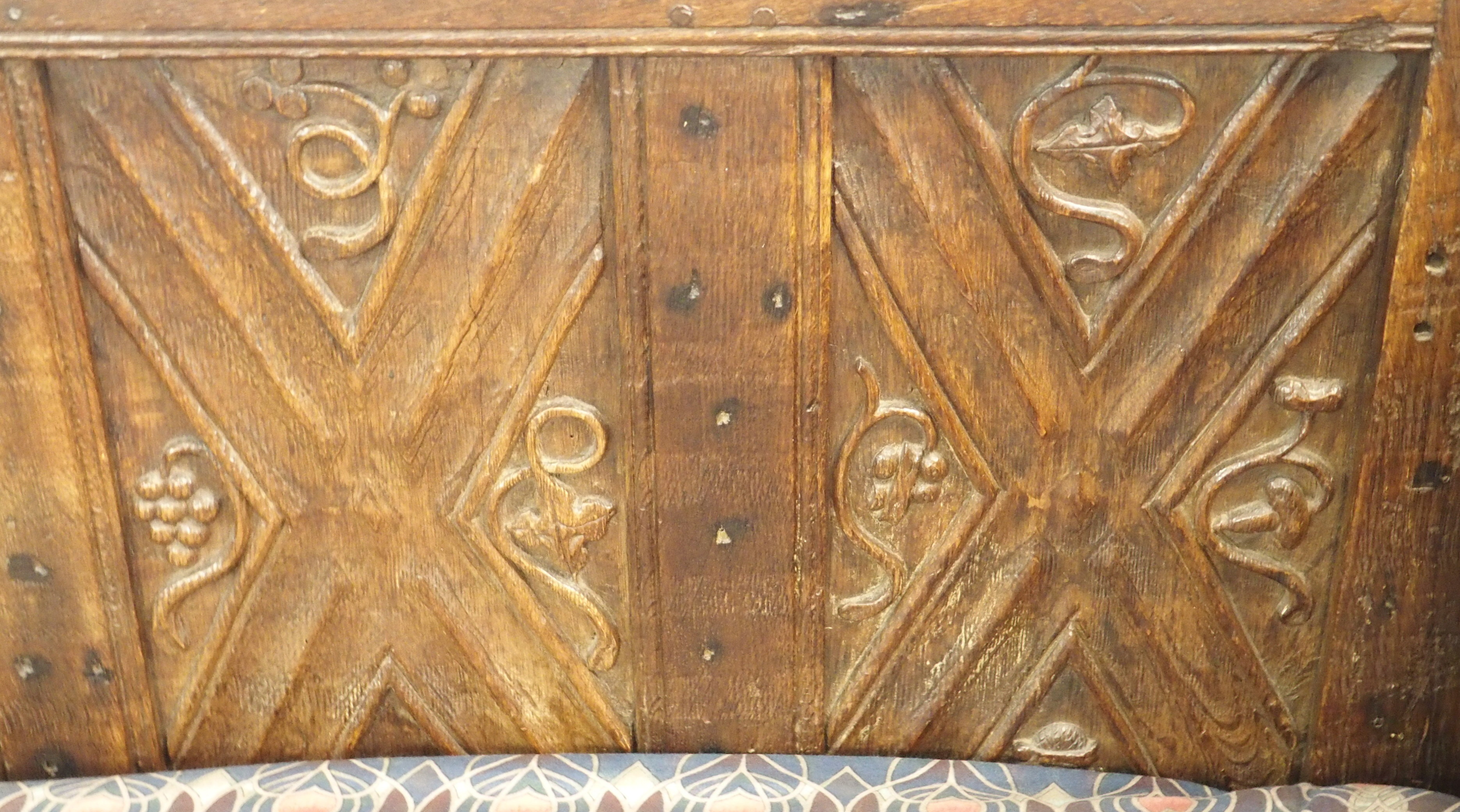 A FRENCH OAK GOTHIC STYLE DAY BED the panels carved with grape vines, chalice,cup and acorns beneath - Image 6 of 14