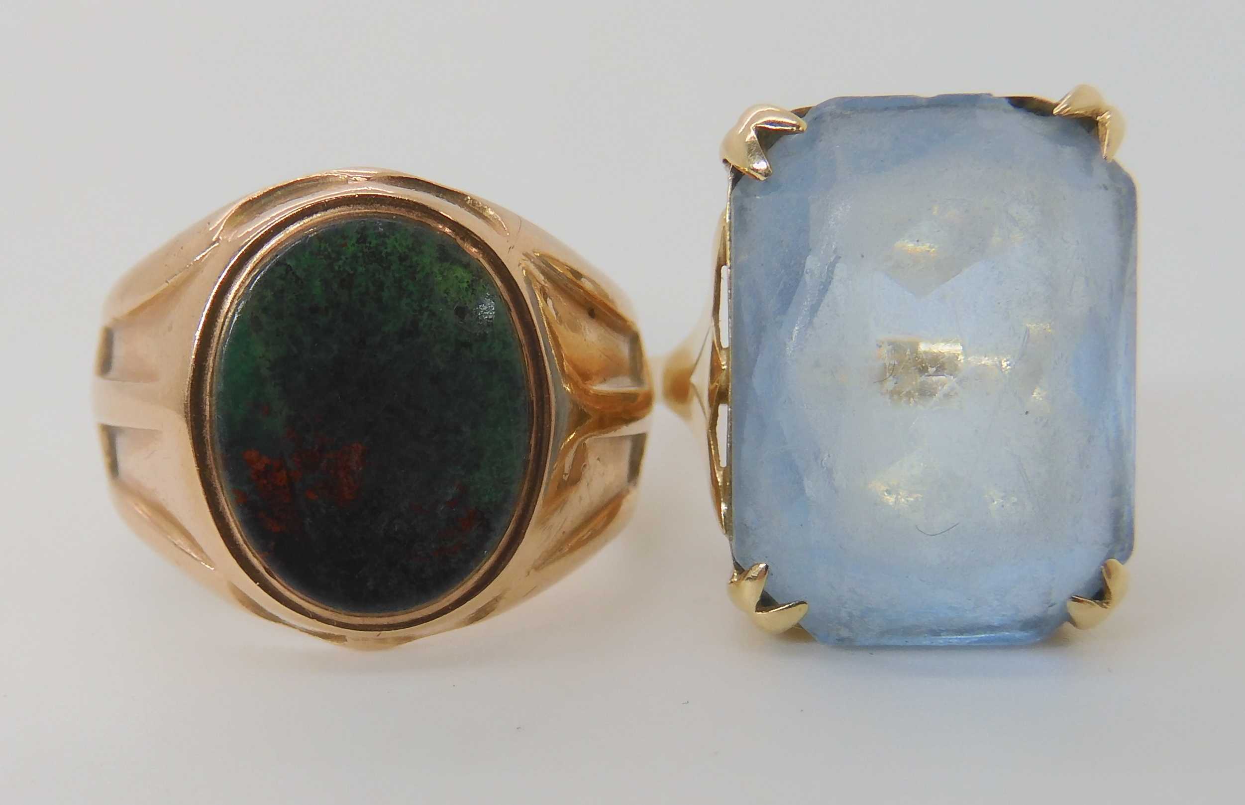 A 9ct gold bloodstone signet ring size N1/2 approx, and a 9ct blue glass ring, size J1/2, weight