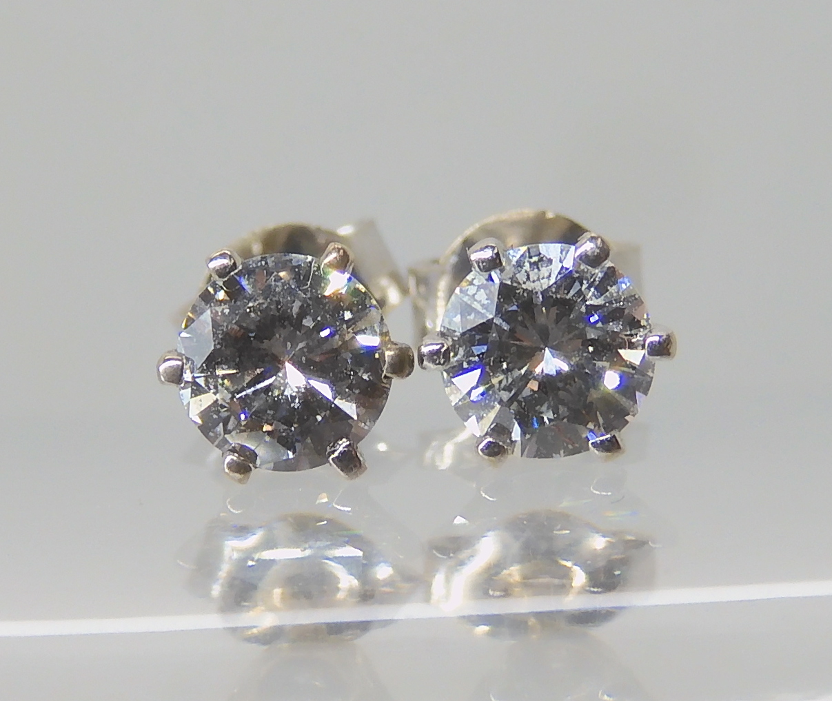 A pair of 18ct white gold diamond ear studs, set with estimated approx 0.80cts in total of brilliant