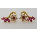 A pair of bright yellow metal red and clear gem set earrings, stamped 916 to the butterflies,