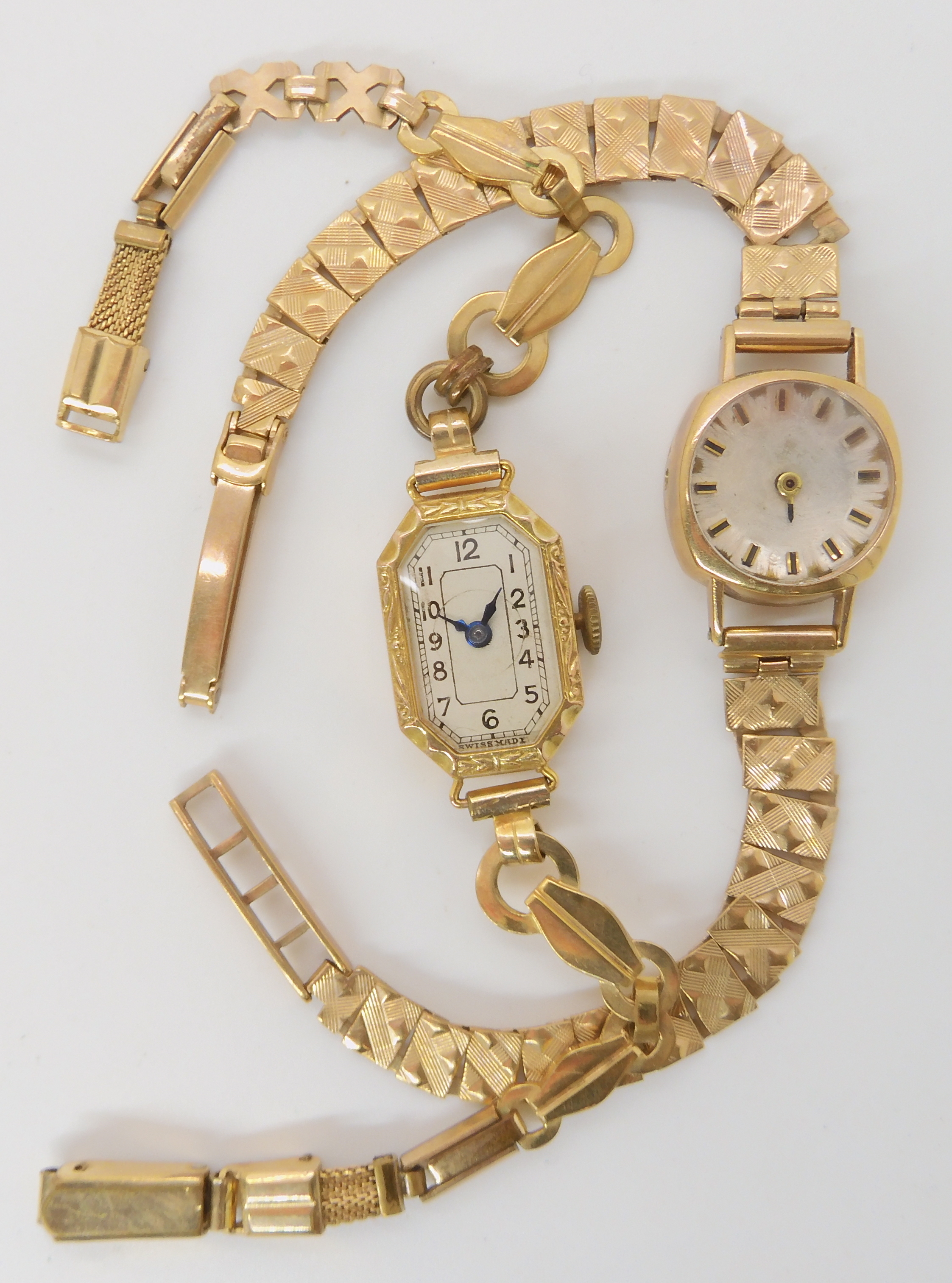 A 9ct gold ladies 9ct watch, weight including mechanism 13.5gms together with a 9ct ladies watch