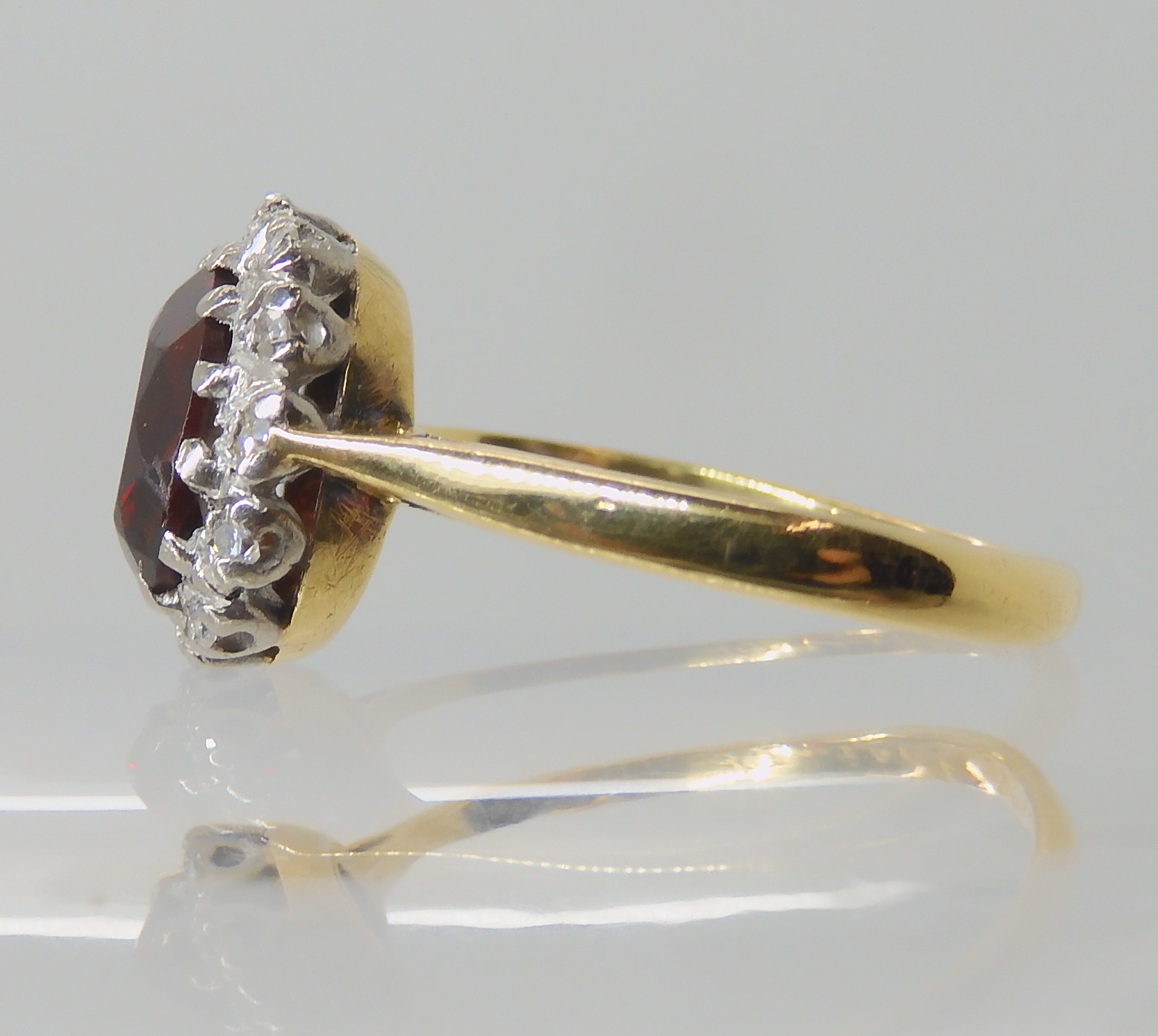 An 18ct gold garnet and diamond ring size L, weight 2.9gms Condition Report: Available upon request - Image 4 of 4