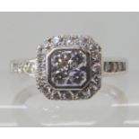An 18ct white gold diamond cluster ring of estimated approx 0.48cts in total, by Beaverbrooks,