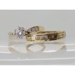 A 9ct gold diamond ring set with estimated 0.25cts of brilliant cut diamonds, size M, together