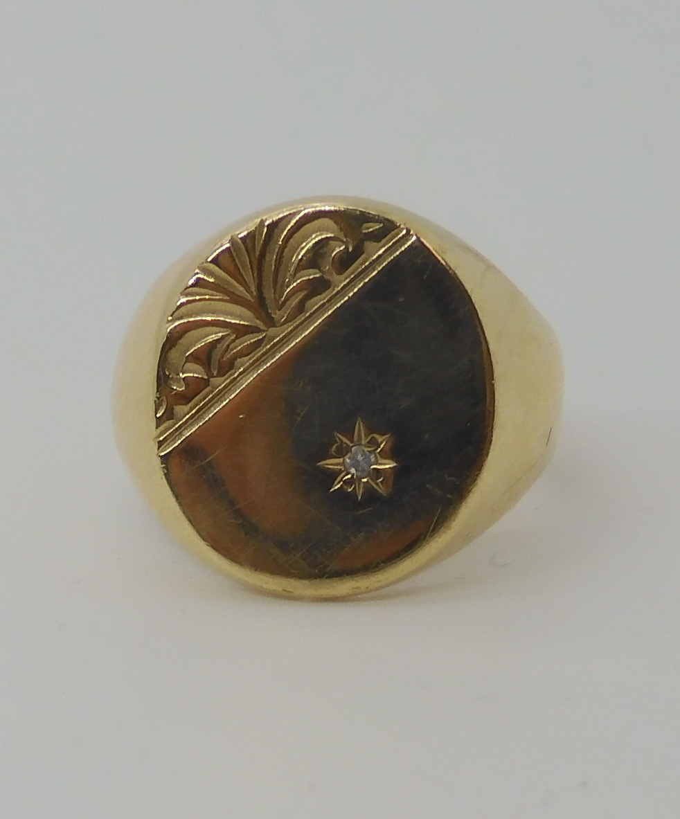 A 9ct gold gents signet ring set with a diamond, finger size R1/2, weight 5.7gms Condition Report: