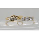 An 9ct gold three stone illusion set diamond ring, size P, together with a 9ct three clear gem set