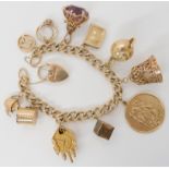 A 9ct gold charm bracelet with eleven attached 9ct charms weight 59.7gms Condition Report: Available