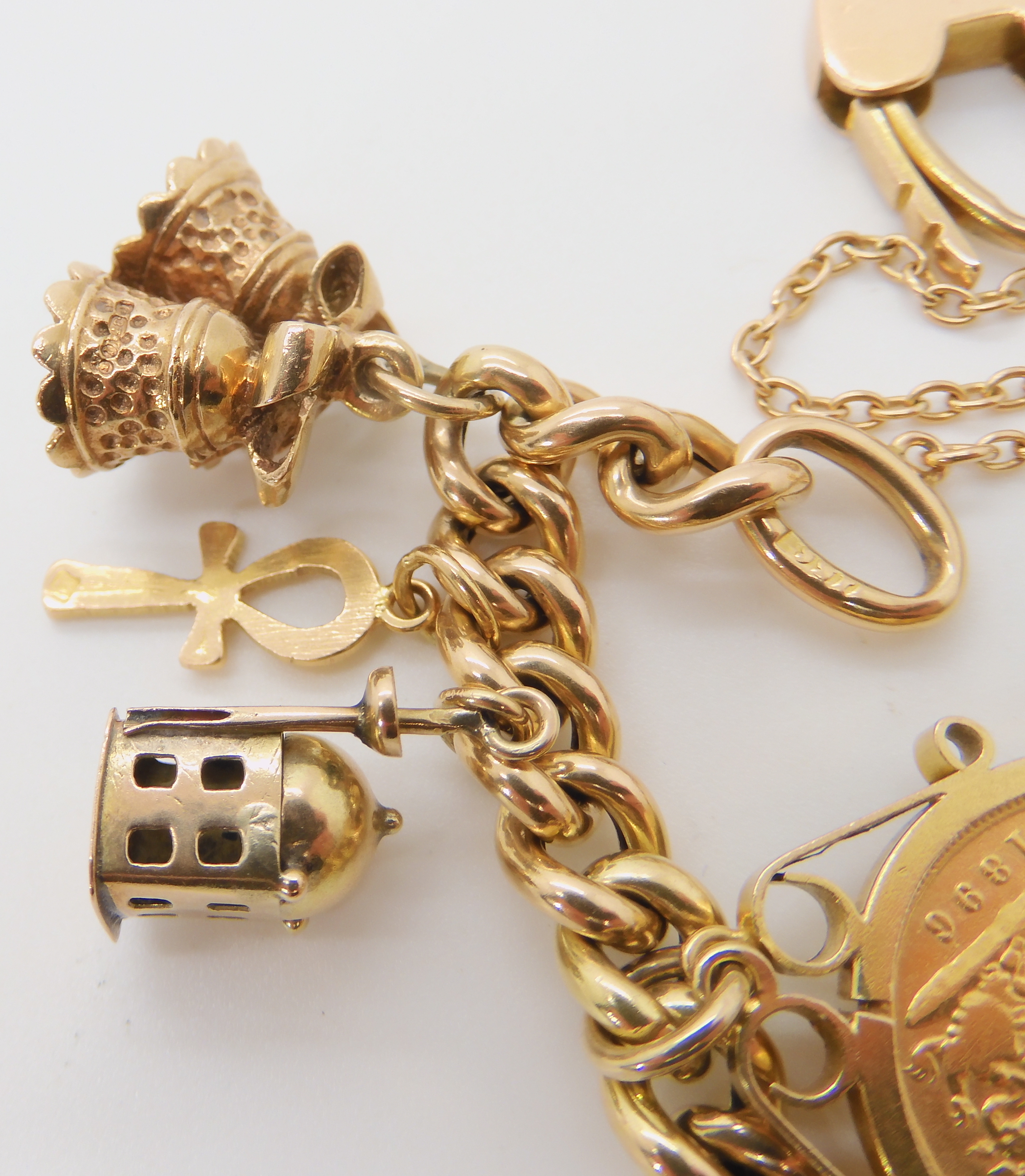 A 15ct gold curb link bracelet with heart shaped clasp, an 1896 half sovereign in 9ct pendant mount, - Image 3 of 3