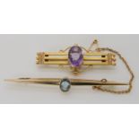 A 15ct gold aquamarine set brooch length 6.5cm, weight 5.4gms, together with a 9ct amethyst set