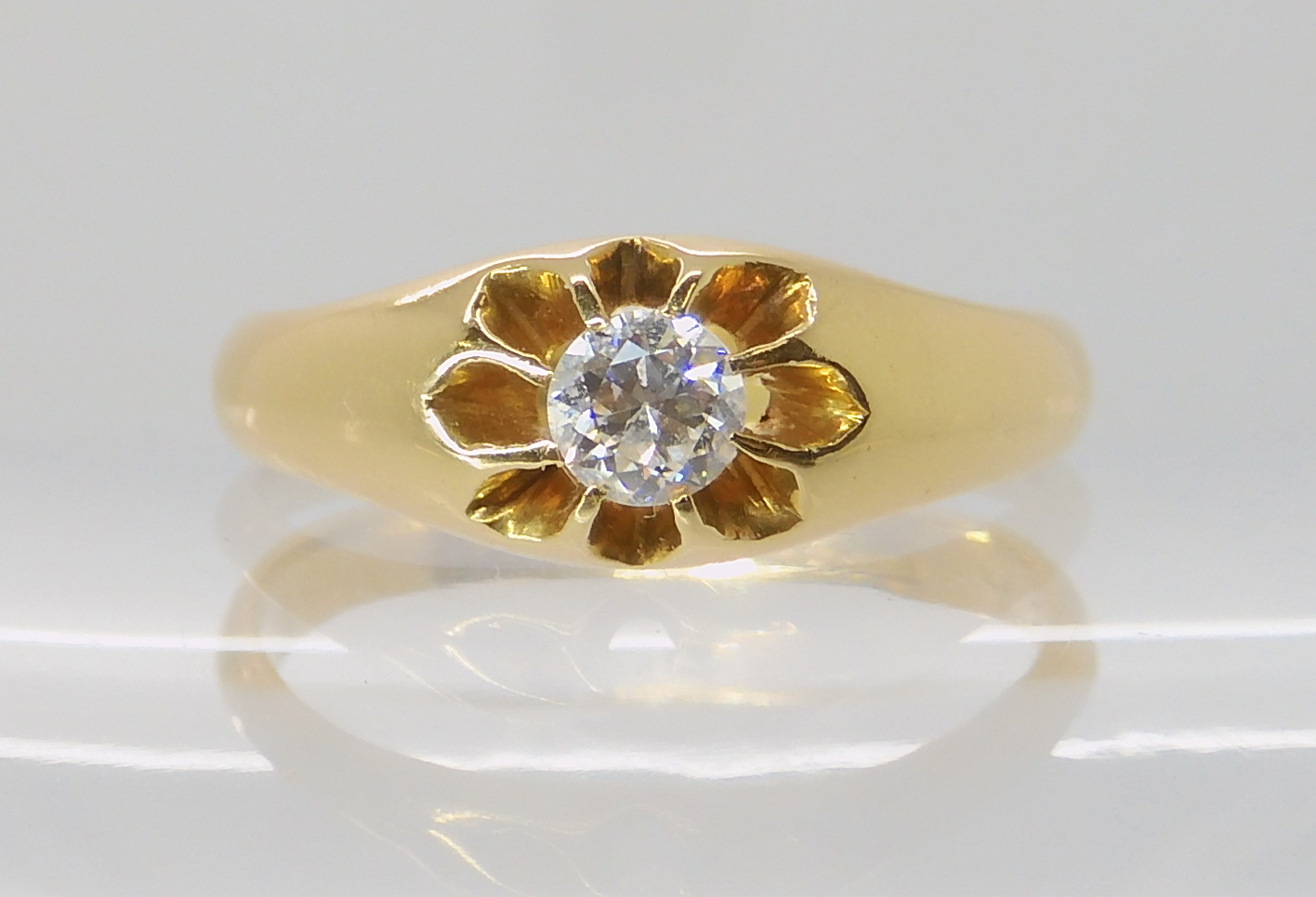 An 18ct gold diamond set gents gypsy ring set with a 0.30ct brilliant cut diamond, size U, weight